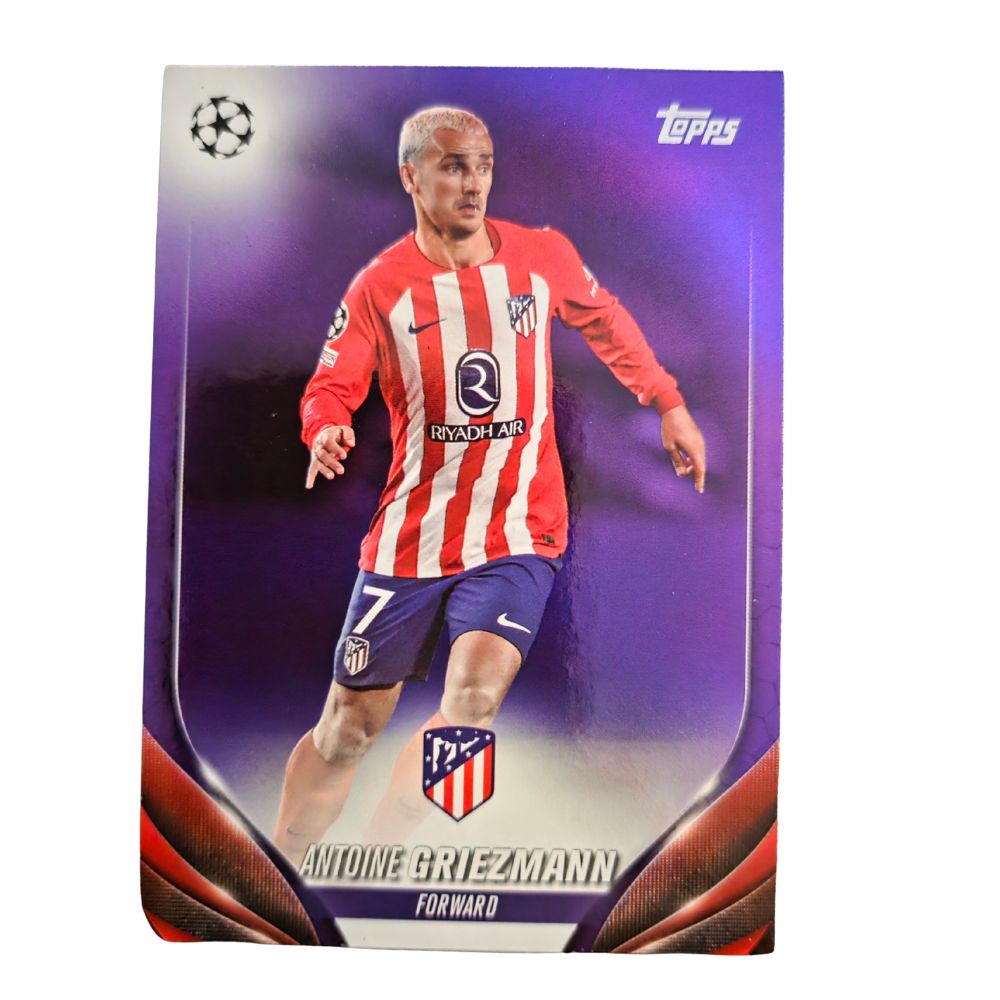 Front of Antoine Griezmann 2023-24 Topps UEFA Club Competitions Purple #190 /299 football card showing player in Atlético Madrid kit