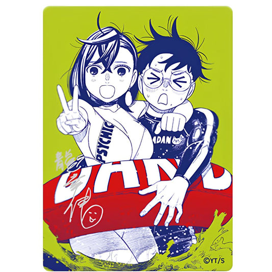Dandadan NatsuComi 2026 MetaKira metallic promo card featuring Momo Ayase and Okarun