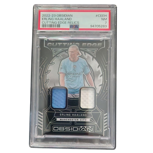Erling Haaland 2022-23 Panini Obsidian Cutting Edge Dual Relics – PSA 7